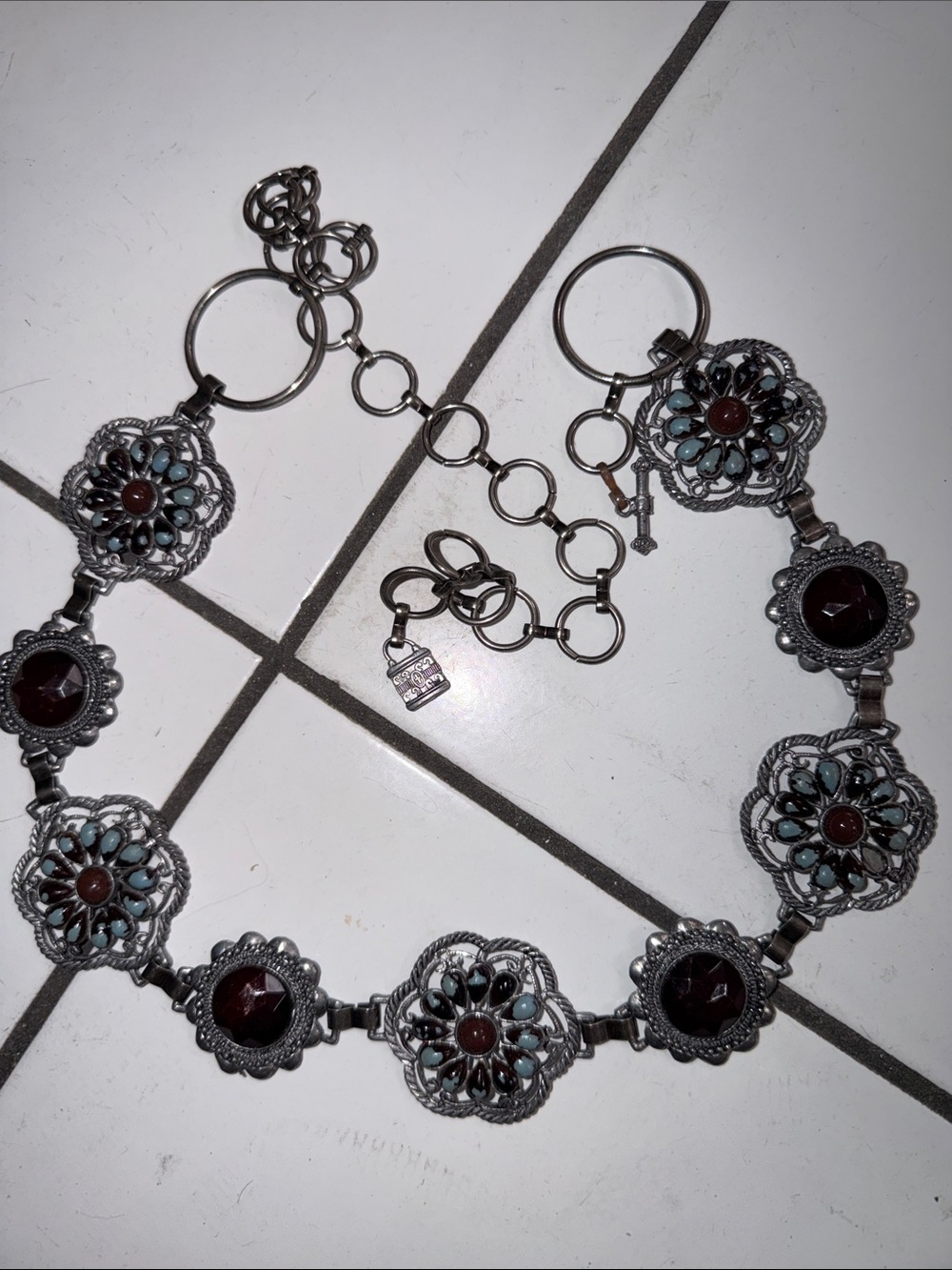 Silver tone Floral Link Belt with Garnet Accents